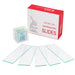Studio arrangement of a box of 4E's USA microscope slides, a plastic case of cover glass, and several individual glass slides fanned out in front.