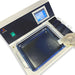 Top-down view of a 4E's USA tissue flotation water bath and slide warmer unit being operated by a gloved hand placing a labeled slide.
