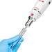 Studio product view of a 4E's USA handheld rotor-stator homogenizer in use, with a gloved hand holding a graduated centrifuge tube around the probe tip against a white background, highlighting its ergonomic white motor housing, red branding, and active homogenization setup