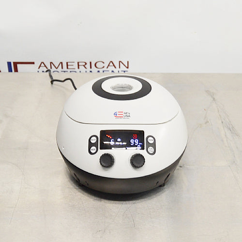 4E's USA high speed micro centrifuge ka straight-on front view, jisme digital LED display screen, control knobs, aur symmetric white dome housing seedhe angle se dikhai de rahe hain.