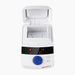 Studio front product view of a 4E's USA mini block heater with an open flip-top heated lid against a white background, highlighting its white compact housing, central block chamber, digital LED control panel with a blue rotary knob, and function buttons