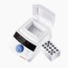 Studio angle product view of a 4E's USA mini block heater with an open flip-top heated lid and a separate removable multi-well sample block alongside the unit against a white background, highlighting its white housing, empty heating chamber, digital LED control panel, and blue dial