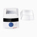 Studio top-down product view of a 4E's USA mini block heater with its clear non-heated lid detached and placed alongside the unit against a white background, highlighting its white housing, empty heating chamber, digital LED control panel, and blue control dial