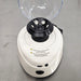 4E's USA brand new mini centrifuge ka open lid top view, jisme open transparent lid, microtube rotor slots, safety warning labels, aur housing base saaf dikhai de rahe hain.   