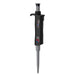 Studio product view of a 4E's USA Per4mance adjustable single-channel pipette (0.1-2uL) against a white background, highlighting its black and gray ergonomic body, gray plunger cap, and branding text