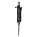 Studio product view of a 4E's USA Per4mance adjustable single-channel pipette (0.5-10uL) against a white background, highlighting its black and gray ergonomic body, gray plunger cap, and branding text