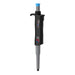 Studio product view of a 4E's USA Per4mance adjustable single-channel pipette (100-1000uL) against a white background, highlighting its black and gray ergonomic body, blue plunger cap, and branding text