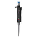 Studio product view of a 4E's USA Per4mance adjustable single-channel pipette (5-50uL) against a white background, highlighting its black and gray ergonomic body, blue plunger cap, and branding text