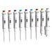 Studio front-facing expanded lineup view of nine 4E's USA Precipette single-channel adjustable pipettes arranged in a row from micro to macro volumes against a white background, highlighting their ergonomic white bodies and distinct color-coded plunger caps