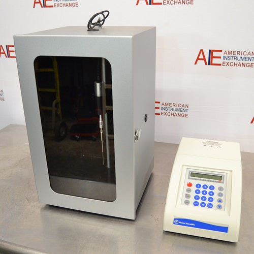 An alternative angled view of a Fisher Scientific FB120 Sonic Dismembrator system available from American Instrument Exchange, showing the control console and the sound-abating enclosure containing the probe.