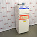 An alternative angled view of a Fisher Scientific Isotemp explosion-proof laboratory refrigerator/freezer combination unit, showing its white double-door exterior, side panel, and top-mounted compressor housing.