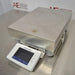 An alternative angled view of a Mettler Toledo XSR32001DR laboratory balance available from American Instrument Exchange, showing its large weighing pan and front-mounted digital touchscreen display.