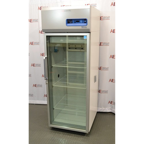 An alternative angled view of a Thermo Scientific TSX2305CA chromatography refrigerator available from American Instrument Exchange, showing its full-length glass door, wire interior shelving, and top-mounted digital control console.
