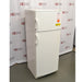 An alternative angled view of a VWR explosion-proof refrigerator/freezer combination unit, showing its white double-door exterior, curved vertical handles, and safety labels on the upper door.