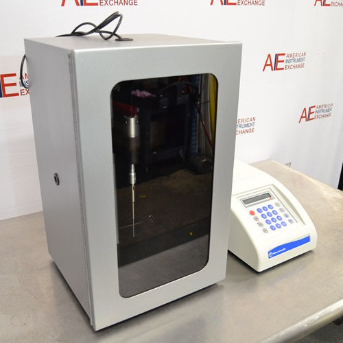 An alternative front-facing view of a Fisher Scientific FB120 Sonic Dismembrator system available from American Instrument Exchange, showing the control console and the sound-abating enclosure containing the probe.