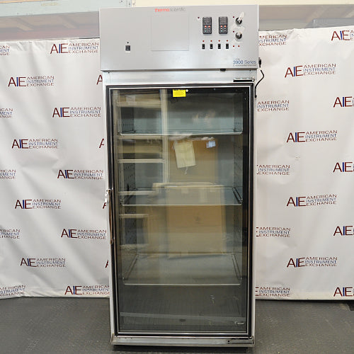 An alternative front-facing view of a Thermo Forma 3940 refrigerated environmental chamber available from American Instrument Exchange, featuring a glass door and top control panel.