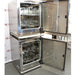 An alternative interior view of two stacked, open-door Thermo Scientific Heracell VIOS 250i CR CO2 incubators available from American Instrument Exchange, highlighting the internal shelving.
