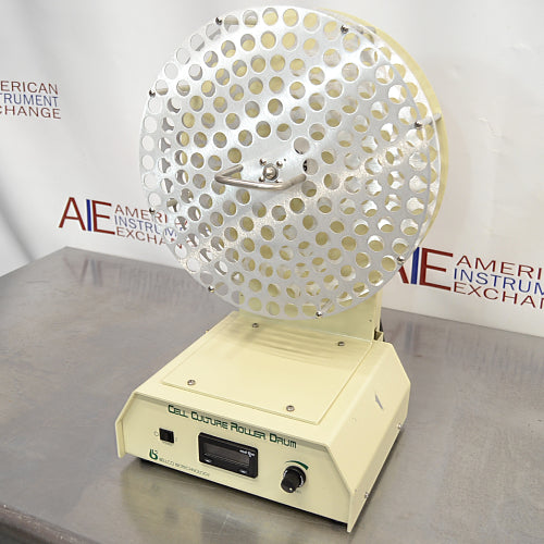 Angled front view of Bellco Biotechnology Cell Culture Roller Drum showing perforated rotating drum and digital control panel