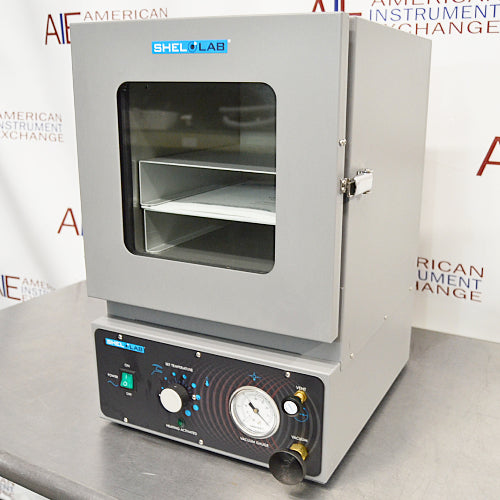 Angled right profile view of Shel-Lab SVAC1E vacuum oven with viewing window, door latch, and control panel