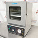 Angled right profile view of Shel-Lab SVAC1E vacuum oven with viewing window, door latch, and control panel