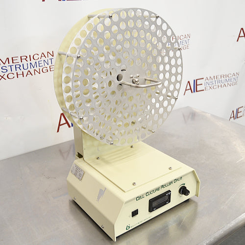Angled view of Bellco Biotechnology Cell Culture Roller Drum showing rotating tube drum and control base