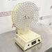 Angled view of Bellco Biotechnology Cell Culture Roller Drum showing rotating tube drum and control base