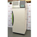 A side-angled view of the Caron 7401-33-22 reach-in CO₂ incubator, showing its light-colored exterior, top-mounted digital display, and green handle, positioned in front of an American Instrument Exchange backdrop.