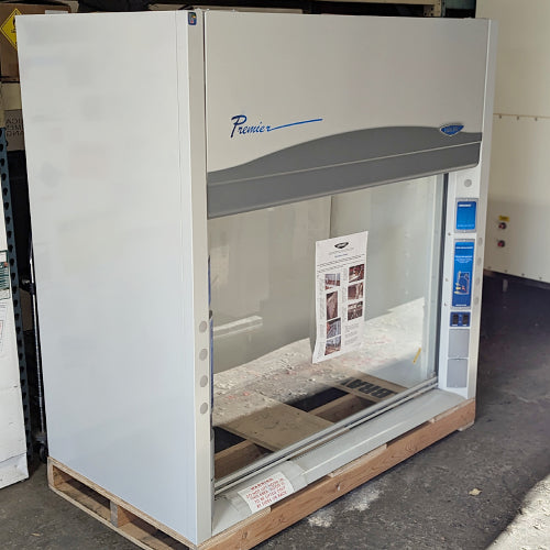 Angled view of Labconco 5 foot Premier laboratory fume hood mounted on a wooden shipping pallet