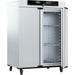 Angled view of Memmert UF750plus forced convection universal oven with right door open showing inner chamber shelving