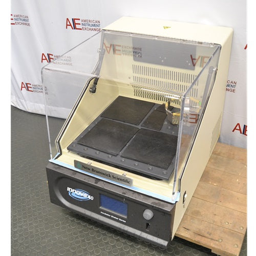 An angled view of the New Brunswick Innova 40R refrigerated incubator shaker featuring a clear lid, internal platform, and control panel.