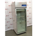 An alternative angled view of a Thermo Scientific TSX2305CA chromatography refrigerator available from American Instrument Exchange, showing its full-length glass door, wire interior shelving, and top-mounted digital control console.