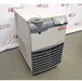 An angled view of the Thermo Scientific ThermoFlex 2500 recirculating chiller, highlighting the top control interface, beige housing, and front ventilation grille against an American Instrument Exchange backdrop.