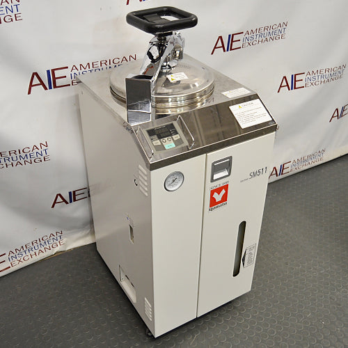 Angled view of Yamato Scientific SM511 vertical steam sterilizer autoclave with top clamp lid