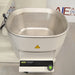 Buchi Rotovapor R-300 rotary evaporator system set on a table, with components including a glass flask, metal stands, and electronic interfaces.