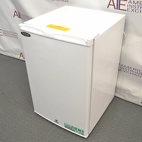 Elevated angled view of Norlake Scientific undercounter laboratory refrigerator showing top panel and door handle