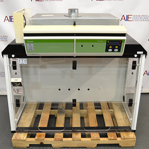 Erlab M481 Captair Flex Ductless Fume Hood positioned on a wooden pallet, featuring a digital control panel, transparent front, and a green and white color scheme.