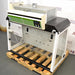 Erlab M481 Captair Flex Ductless Fume Hood positioned on a wooden pallet, featuring a digital control panel, transparent front, and a green and white color scheme.