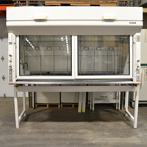 A white Fisher Hamilton 8' Chemical Fume Hood with a base stand, featuring a glass sash, a white epoxy work surface, and various fixtures such as monkey bars and external duplex outlets.
