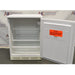 Fisher Scientific Isotemp Value laboratory undercounter refrigerator with open door showing interior shelves and bottom compartment