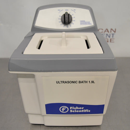 Straight-on studio view of a Fisher Scientific M1800 1.9L ultrasonic bath, showing its front branding panel, white enclosure, top cover with a central handle, and sloping control console with a timer dial
