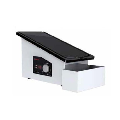 Side angled view of a Four E's Scientific slide warmer featuring an angled black heating surface, digital side control panel, and a pull-out storage drawer on a white background.