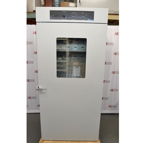 A front-facing view of a Shel Lab SCO40 large capacity CO2 incubator available from American Instrument Exchange, showing its solid white outer door with an integrated viewing window and a top-mounted control panel.