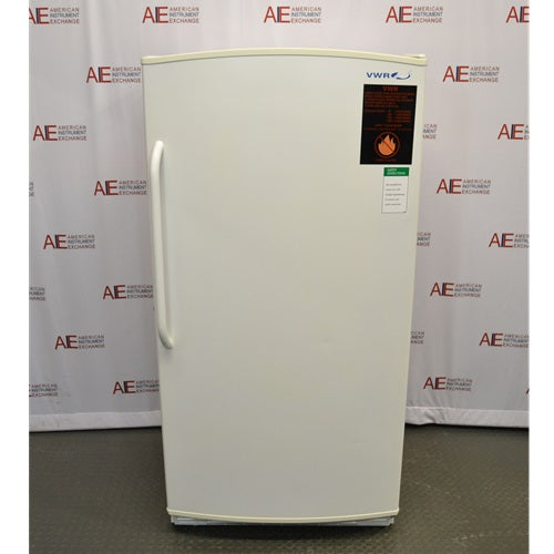 A front-facing view of a VWR R421FA15 flammable material storage refrigerator available from American Instrument Exchange, showing the solid white exterior door, handle, and safety warning label.