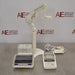A front-facing view of a Mettler Toledo SevenExcellence multiparameter meter setup on a stainless steel surface in front of an American Instrument Exchange backdrop, featuring a touchscreen main unit, attached electrode arm, printer module, and power supply cables.