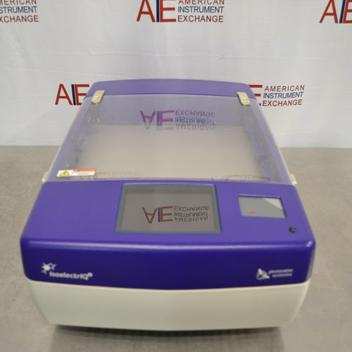 A front view of a blue and off-white Proteome Systems IsoelectrIQ featuring a clear lid, front touchscreen control panel, and IsoelectrIQ branding against an American Instrument Exchange backdrop.