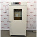 Front view of a closed, white Shel Lab 2428 CO2 incubator with a glass door window and top control panel.