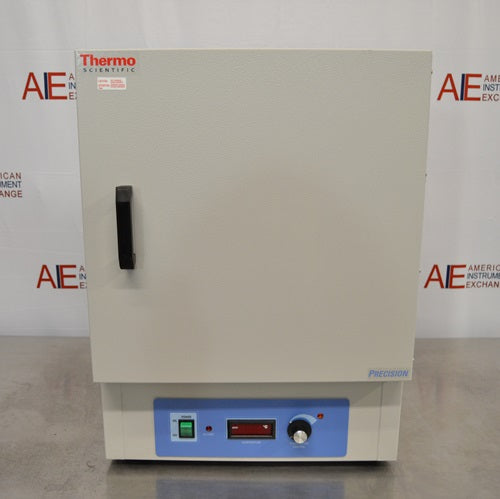 A head-on front view of a Thermo Scientific PR305225M Precision mechanical convection oven resting on a benchtop in front of an American Instrument Exchange backdrop, featuring a closed cream-colored front door with a black handle, a blue control panel at the base with a power switch, digital temperature display, and temperature adjustment knob.