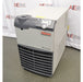 A high-angle view of the Thermo Scientific ThermoFlex 2500 recirculating chiller, showcasing its top control interface, beige cabinet, and front intake grille in front of an American Instrument Exchange backdrop.