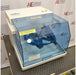 A high-angle view of the Willy A. Bachofen TURBULA T2 three-dimensional shaker mixer with its blue transparent safety enclosure, displayed against an American Instrument Exchange backdrop.