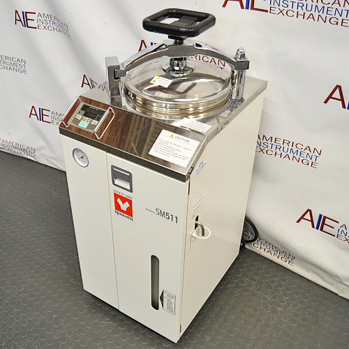 High-angle perspective of Yamato Scientific SM511 vertical steam sterilizer autoclave with top clamp lid
